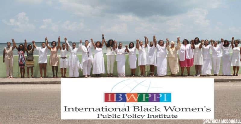 Group of women in white holding hands | Image for Membership | IBWPPI